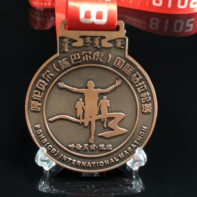 China Europe free sample custom your own international marathon sport zinc alloy antique red copper medal for sale