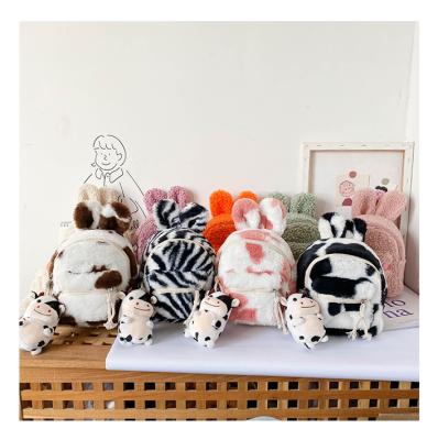 China Fashion Free Shipping Babies Rabbit Ear Bag Cow Printing Backpack Children Plush Toy Cozy Fleece Backpack for sale