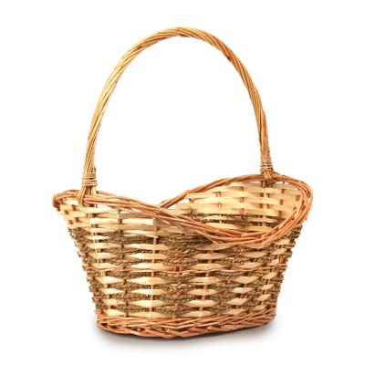 China Sustainable Factory Direct Brown Woven Oval Wicker Gift Storage Baskets With Handle for sale