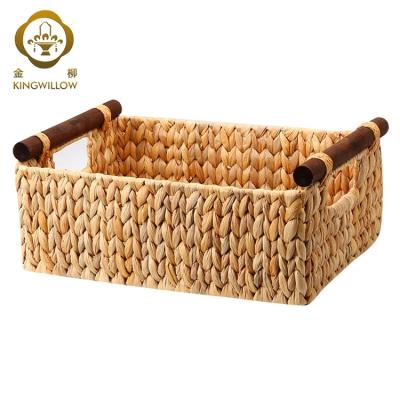 China Eco - Friendly Natural Stocked Water Hyacinth Storage Baskets With Wooden Handles for sale