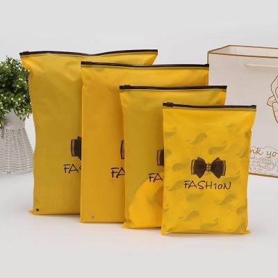 China Recyclable Custom Logo Biodegradable Zip Lock Clothes Packaging Black Frosted Apparel Matte Zipper Bag for sale