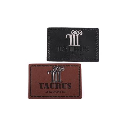 China Viable factory new fashion and labels high quality custom metal embossed metal plate label for garment for sale