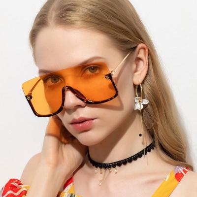 China Hot Fashion Sunglasses Women Fashion One Piece Oversized Rimless Half Half Frames Sun Shades Sunglasses for sale