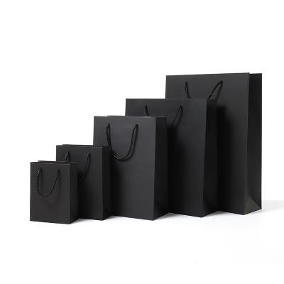 China Hot Selling New Product Handmade Craft Paper Custom Gift Bags Packaging With Logo for sale