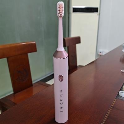 China 5 Modes Battery Operated IPX7 USB Charging 2 Brush Heads Sonic Electric Toothbrush 500MHA for sale