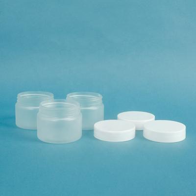 China Small Pet Jars 30ml 1oz Luxury Plastic Face Cream Cosmetic Jar Plastic Jars Wholesale Plastic Cosmetics for sale