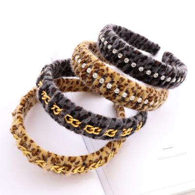 China Plush Fabric Leopard Print Fluffy Headband Crystal Chain Decoration Woven Hairband for sale