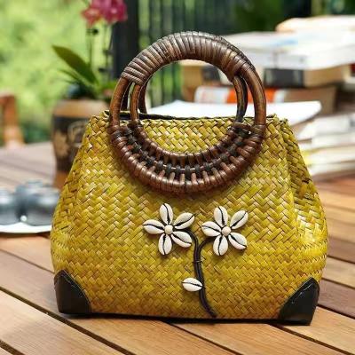 China PORTABLE New hot selling ethnic style round hand-held bamboo bag summer beach travel leisure shell women's bag rattan bags bali for sale