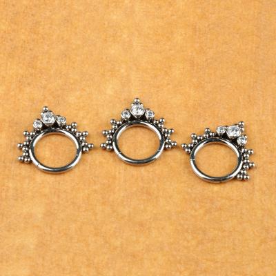 China ASTM-F136L Romantic CZ Titanium Pave Face with 3 CZ Circles and 23 CZ Balls Blaze Rings Set Side Hinged Segment for sale