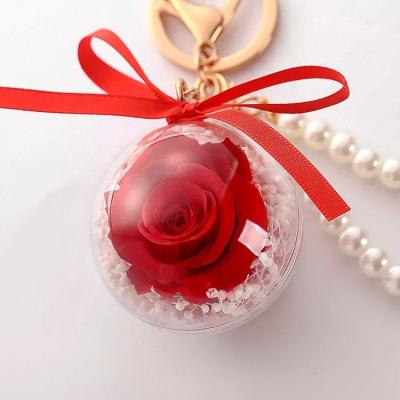 China Luxury And Good Quality Preserved Flower Wedding Gift Key Chain For Christmas Gift for sale