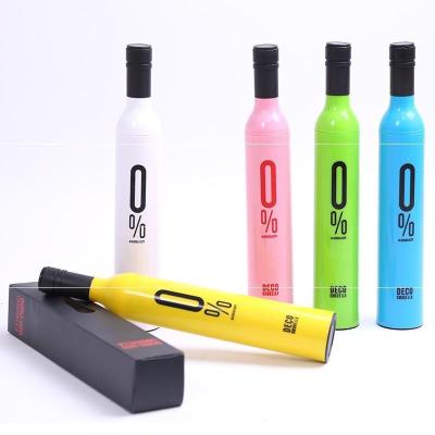 China Cheap Price Automotive Promotional Gifts Customized Logo Manual Open 3 Times UV Rainy Sunny Travel Wine Shape Bottle Umbrella With Logo for sale