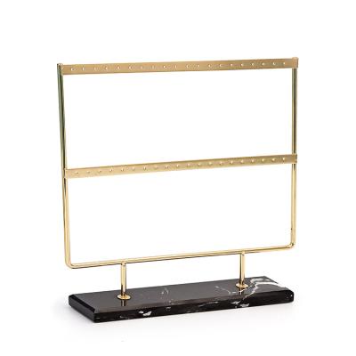 China Jewellry Store Two Rails Metal Earring Gold Display Stand With Black Marble Base Metal Jewelry Display Stand for sale