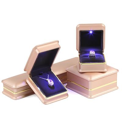 China Customized High Quality Recyclable Logo Paint And Flannel Material Led Light Jewelry Box for sale