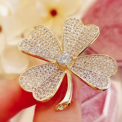 China Luxury four leaf flower lucky micro brooch accessories - atmospheric high-grade inlaid zircon brooch suit pin buckle for sale