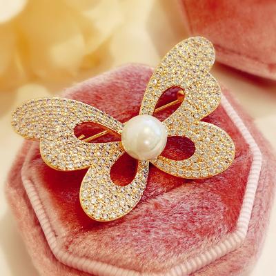 China Corsage Women's Brooch Women's Luxury Soft Micro Inlaid Zircon Temperament Costume Accessories Cardigan Pin Buckle for sale