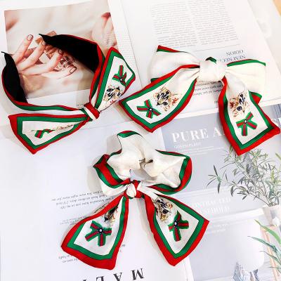 China European and American explosive fashion Korean silk hair band cute big bow hair clip plaid cat hair style hair band for sale