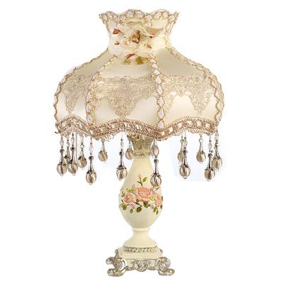 China Modern High Quality European Crystal Luxury Decorative Lamp Table Art Warm Bedside Lamp for sale