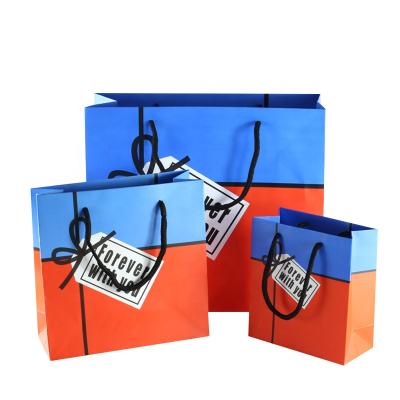 China Recyclable Recycled Custom Logo Coated Paper Bag Shopping Bag Craft Paper Carrier Bag With Handle for sale