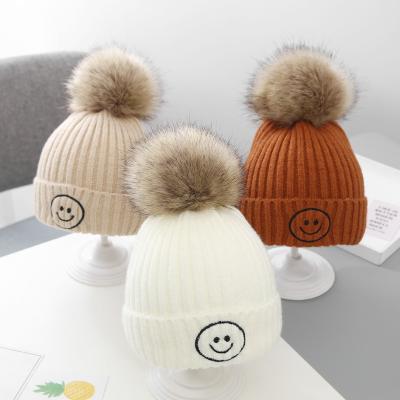 China 2021 COMMON New Arrive Fashion Embroidered Knitted Winter Warm Woolen Pom Pom Kids Smiley Beanies Caps Hats Solid Color for sale