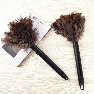 China Plastic cleaning handle and eco-friendly reusable handheld ostrich feather duster for sale