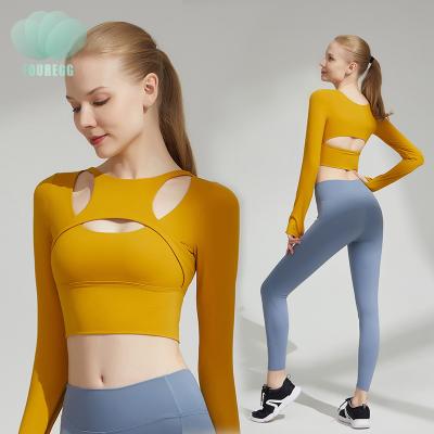 China Custom Logo Yoga Clothing Women's Breathable Sports Suit With T-shirt Chest Pad Long Sleeve Seamless Yoga Set Workout Fitness Along for sale