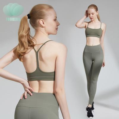 China Breathable Custom Logo 2 Piece Yoga Apparel Gym Fitness Tops Seemless Ladies Sports Bra And Yoga Running Sexy Pants Set for sale