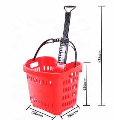 China 1) Supermarket 2)shops red two wheels plastic rolling shopping basket with handle for store / supermarket for sale