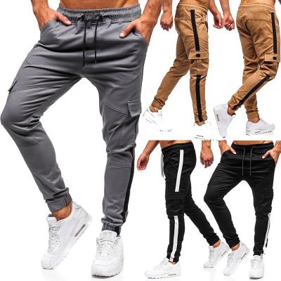 China Custom Logo Anti-Wrinkle Sports Running Pants Pockets Soccer Football Panties Shaping Elasticity Jogging Pants Gym Striped Legging for sale