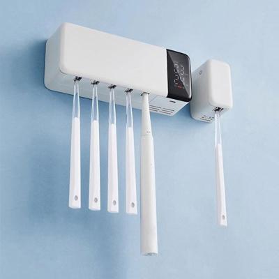 China UV Disinfection Quick Sterilisering Waterproof Family Drying With Fan Wall Mount Sterilized UV Toothbrush Holder for sale