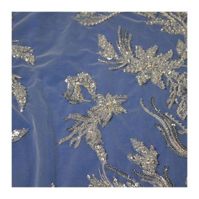 China Viable popular factory direct supplier design elegant bridal dubai wedding tulle white sequin beaded embroidery fabric lace for wedding for sale