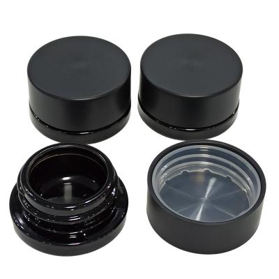 China 5ml 7ml Eco-friendly Recyclable Small Black Wax Child UV Proof Concentrates Glass Jar Child Safe Glass Container With Child Resistant Lid for sale