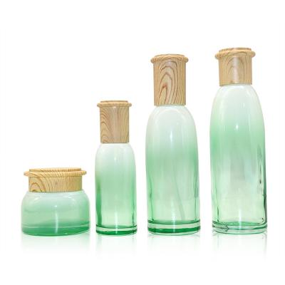 China Eco - Friendly Recyclable Empty Organic Cosmeceuticals Spray / Green Cosmetic Packaging Pump Bottles And Jar Containers Set With Custom Label for sale