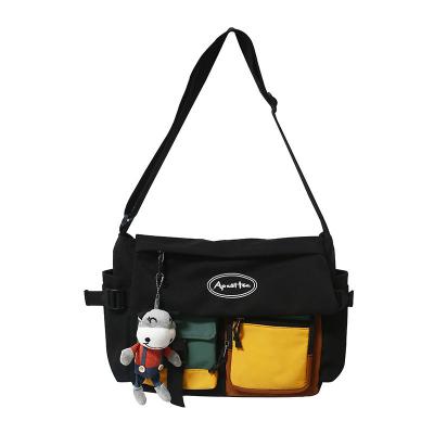 China Waterproof Color Bump Cross - New Tide Color Brand Body Bag Match Shoulder Bag Leisure Sports Tide Cool Messenger Bag for sale