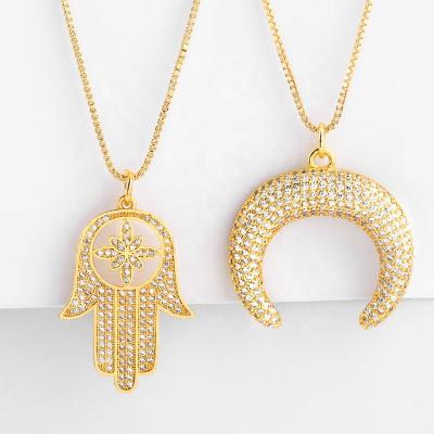 China Fashionable CLARMER Personality Gold Plated Diamond Palm Moon And Palm Dangle Women's Necklace Luxury Wholesale for sale