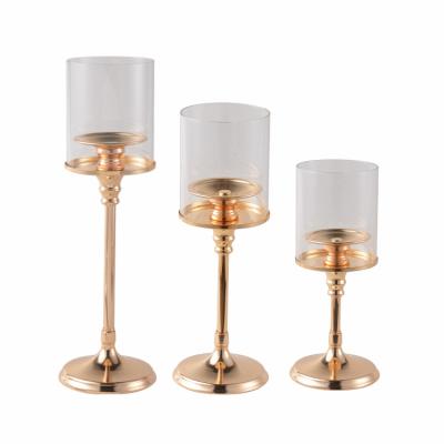 China Luxury Classic Nordic Modern Metal Tealight Candles Holder Glass  Wedding Luxury Gold Candlestick Holders for sale