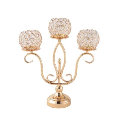 China All Factory Supplies Antique Home Decoration Metal Flower Crystal Candlestick In Stock for sale