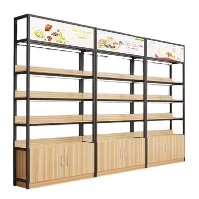 China 4 Layer Metal Grocery Display Rack Multi-Function Wooden Snack Aisle Shelf for sale