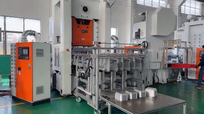 Cina Macchina per la fabbricazione di contenitori in foglio di alluminio da 26 kW con dimensioni di piastre alimentari da 1220 × 900 mm in vendita