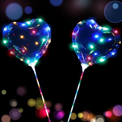 China Cheap TPU Heart 18Inch Colorful Lights Helium Merry Christmas Flashing Bobo Balloon With Handle Stick Transparent Led Party for sale