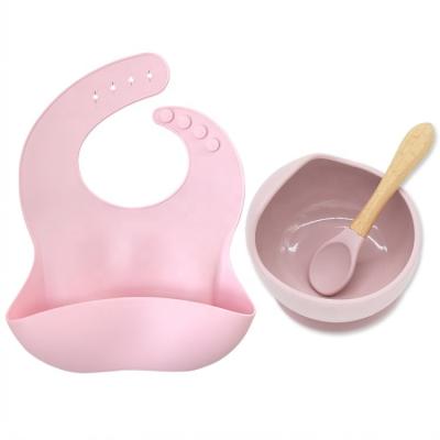 China Low MOQ BPA Free Silicone Baby Feeding Tableware Bibs Roll Spoon Dish Set for sale