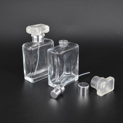 China Personal Care 50ml Empty Glass Spray Perfume Bottles With Crimp Neck for sale