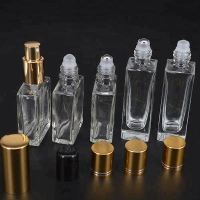 China Personal Care High End 30ml Flat Square Essential Oil Rectangular Clear Glass Roll On Bottle With Gold Silver Black Cap for sale