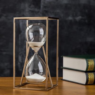 China Minimalist Amazon Hourglass 2022 With Frame Sand Timer Metal Hourglass Sand Clock for sale