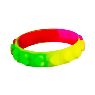 China 2021 Sports Segment Ethnic Custom Mix Color Embossed Silicone Wristbands for sale