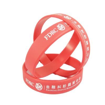 China 2021 Ethnic Fashion Customized Debossed Coloring Ink Printing Silicone Silk Wristband for sale