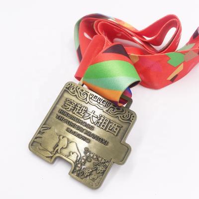 China Cheap USA Prize Medal China Old Zinc Alloy Metal Increasing Sport Medal Manufacturer Challenge Medal for sale