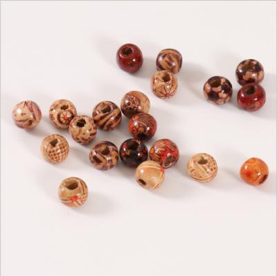 China Handmade DIY Beaded Big Hole Bead Exquisite Printing Painted Wooden Bead By Wooden Pattern for sale