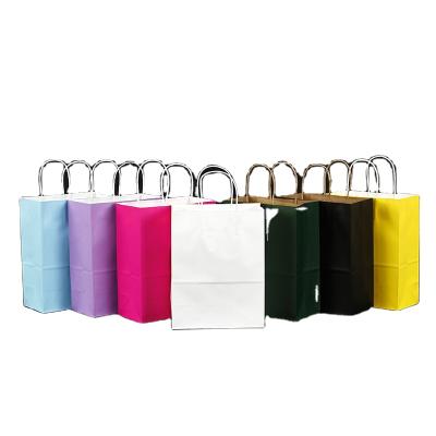 China Large Extra Large Biodegradable Colorful Kraft Paper Bags Reusable Boutique Perfume Wedding Paper Bags for sale