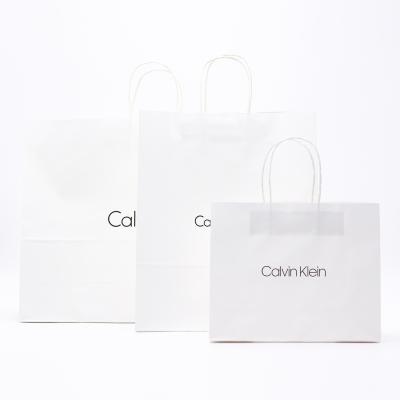 China Best Selling Biodegradable Goods Using 5kg Paper Bag With Handle White Kraft Paper Bag for sale