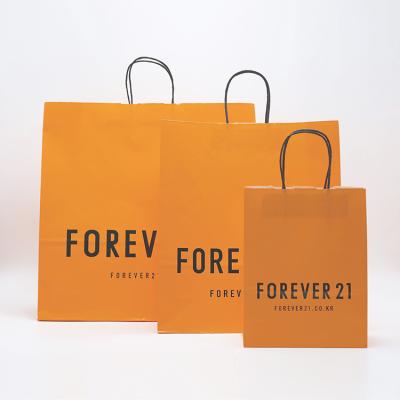 China Hot Selling Biodegradable Personalized Orange Single Coated Biodegradable Kraft Bag Paper Sack Custom Shopping Paper Bags for sale